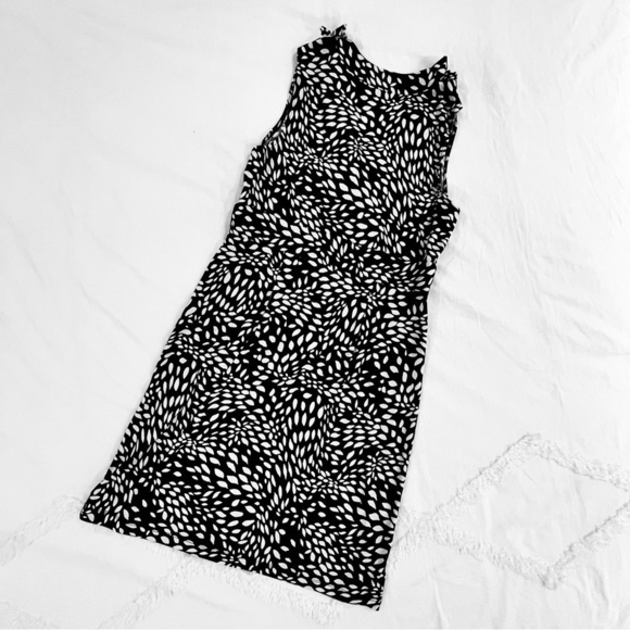 London Style Sleeveless Ruffle Dress | Black White V Neck Knee Length Polka Dot - Picture 2 of 9